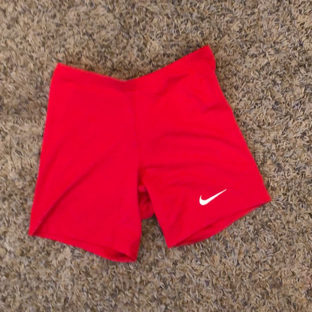 Red Nike compression shorts